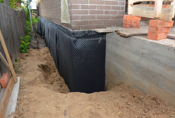 SJ Waterproofing Pros technician performing targeted Emergency Waterproofing assessment in Prospect Heights, IL